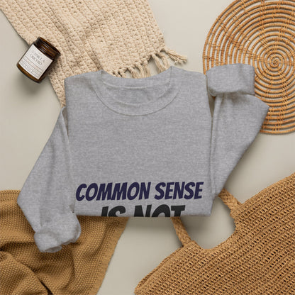 Crewneck Sweatshirt – "Common Sense Is Not That Common" Graphic Pullover
